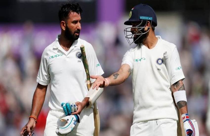 चेतेश्वर पुजारा और विराट कोहली।(Source: Reuters)