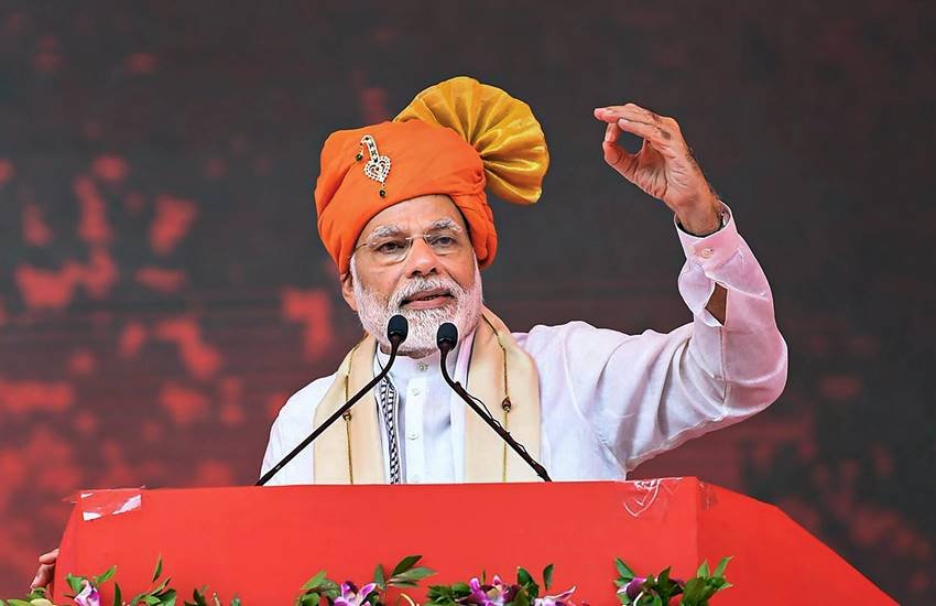 आणंद : एक जनसभा को संबोधित करते प्रधानमंत्री नरेंद्र मोदी। (Photo : PTI) आणंद : एक जनसभा को संबोधित करते प्रधानमंत्री नरेंद्र मोदी। (Photo : PTI)