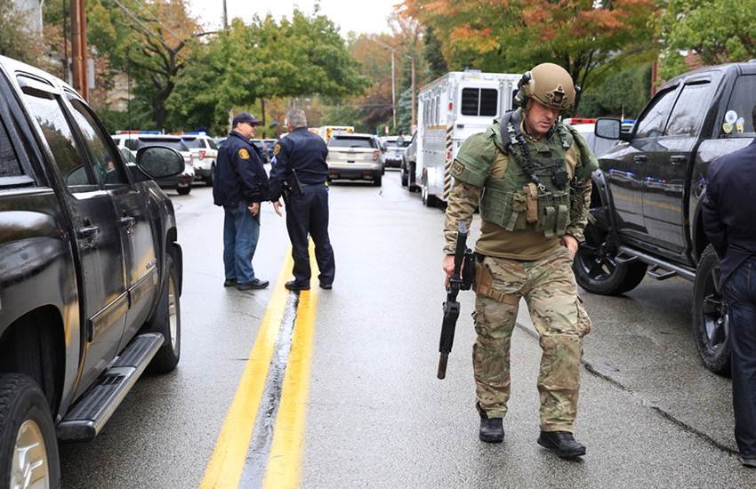Police officers respond after a gunman opened fire at the Tree of Life synagogue in Pittsburgh Pennsylvania Police officers respond after a gunman opened fire at the Tree of Life synagogue in Pittsburgh Pennsylvania