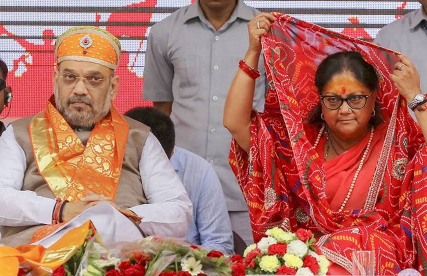 बीजेपी अध्यक्ष अमित शाह और राजस्थान की मुख्यमंत्री वसुंधरा राजे। (पीटीआई फाइल फोटो)