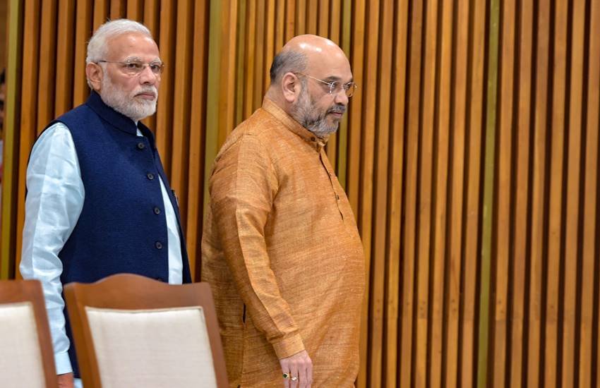 भाजपा की केंद्रीय चुनाव समिति की बैठक के दौरान प्रधानमंत्री नरेंद्र मोदी व पार्टी अध्‍यक्ष अमित शाह। (File Photo : PTI)