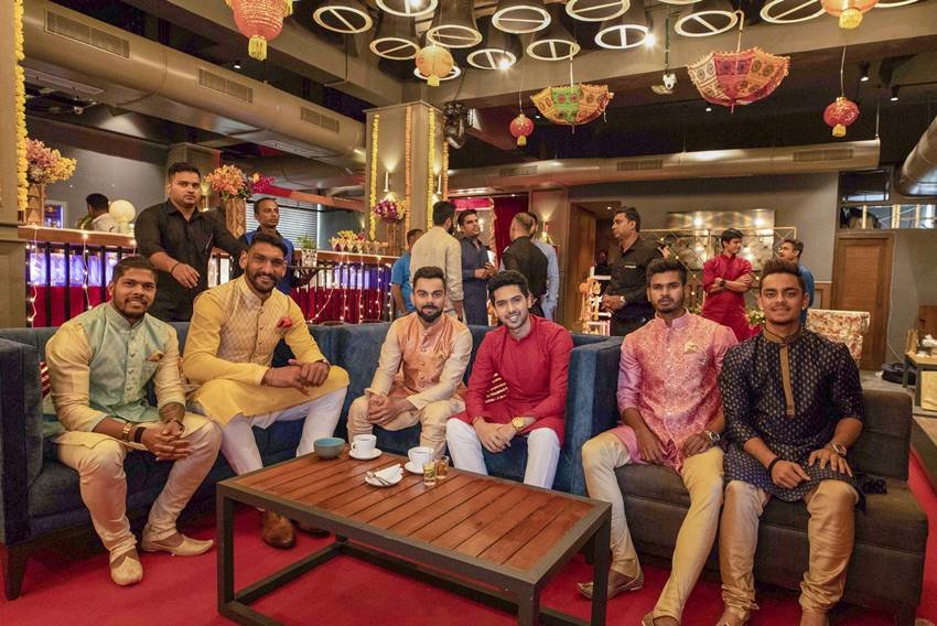 Virat Kohli Style, Stylish Indian Cricketers, Virat Kohli MensXP, Virat Kohli Fashion, Virat Kohli Dharavi kids, Virat Kohli Diwali, Virat Kohli Manyavar, kohli diwali with kids, kohli latest pics