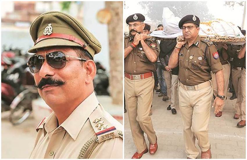 बुलंदशहर हिंसा में शहीद हुए इंस्पेक्टर सुबोध कुमार सिंह (बाएं) की तस्वीर और उनके पार्थिव शरीर को कंधा देते पुलिस अधिकारी। (PTI/EXPRESS Photo)