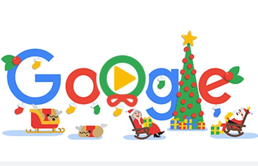 Google Doodle LIVE Updates: दूसरे O को पीले रंग से लिखा है। इस O पर लाल रंग की 2 लाइट के साथ एक पीले रंग का गिफ्ट लटका है। 