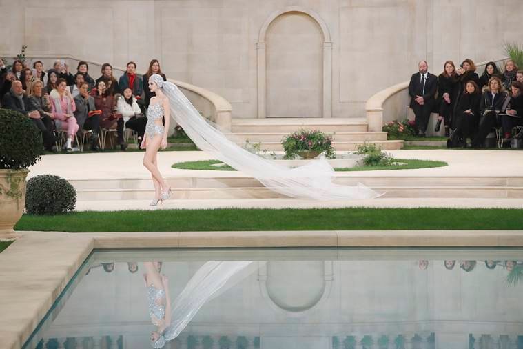 chanel, chanel haute couture bridal swimsuit, haute couture bridal swimsuit, mediterranean gardens, grand palais in paris, cathedral-length veil, one-piece bathing suit in lieu traditional wedding dress, chanel spring 2019 haute couture collection,