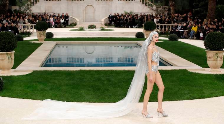 chanel, chanel haute couture bridal swimsuit, haute couture bridal swimsuit, mediterranean gardens, grand palais in paris, cathedral-length veil, one-piece bathing suit in lieu traditional wedding dress, chanel spring 2019 haute couture collection,