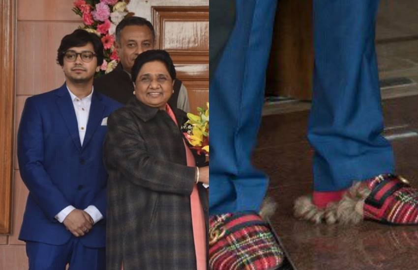 मायावती के साथ खड़ा शख्स उनका भतीजा बताया जा रहा है। (Image Source: Twitter/@Benarasiyaa and @pankajjha_)