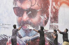 rajinikanth, paal abhishekam, paal abhishekam rajinikanth, simbu, simbu paal abhisekam, str, rajinikanth fans, rajinikanth release celebration, ranjinikanth milk worship, ajith