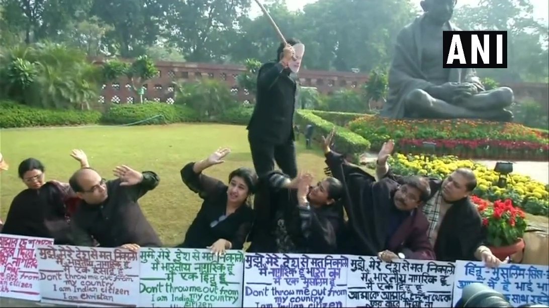 "संसद में प्रदर्शन, मोदी का मुखौटा, नागरिकता संशोधन विधेयक 2016, टीएमसी सांसद, Winter session, TMC MP, Citizenship Amendment Bill 2016, india News, india News in Hindi, Latest india News,