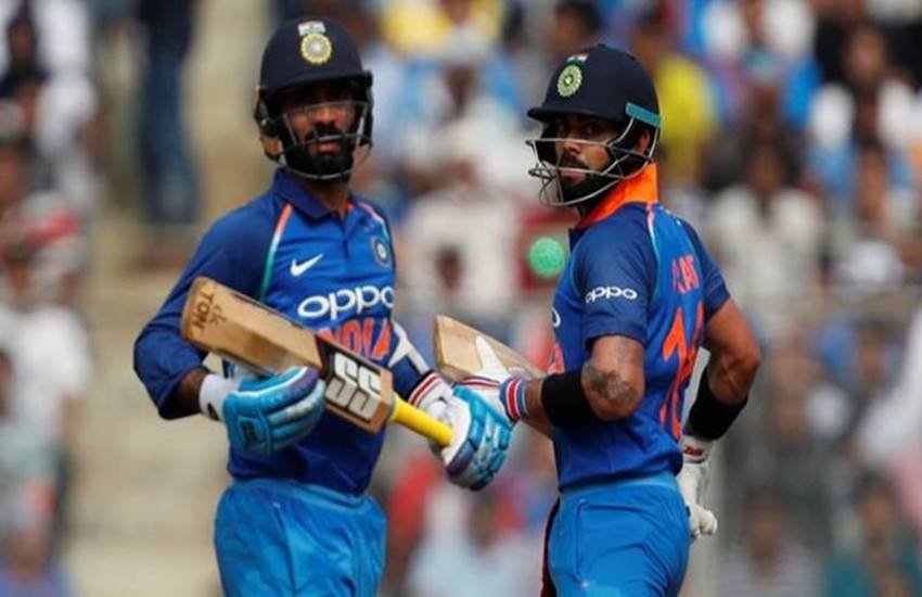 दिनेश कार्तिक और विराट कोहली। (Source: Reuters)