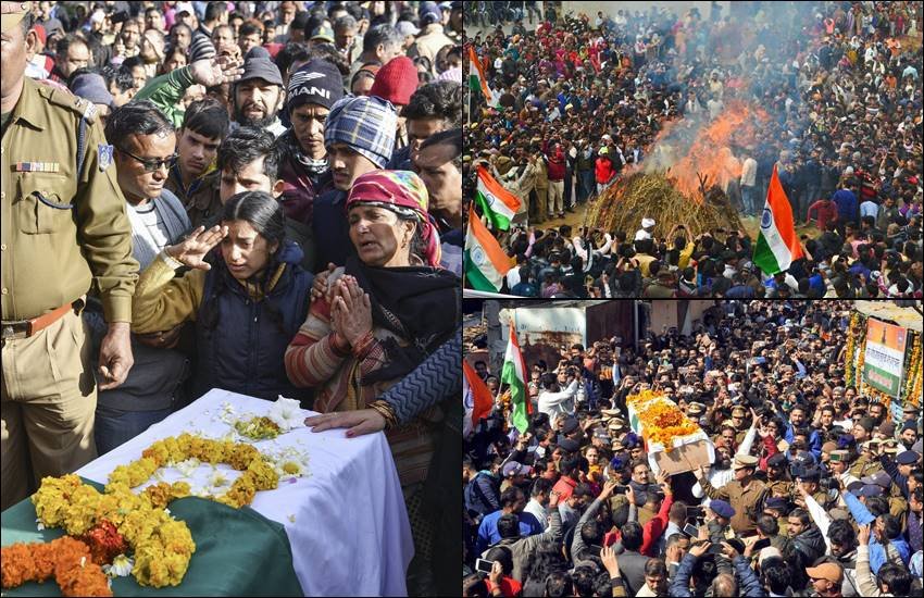 पुलवामा हमले में शहीद जवानों को शनिवार के दिन अंतिम विदाई दी गई। आतंकी हमले में शहीद हुए जवान राजस्थान, उत्तर प्रदेश, तमिलनाड़ु, पंजाब, उत्तराखंड, कर्नाटक, मध्यप्रदेश, जम्मू राज्यों से ताल्लुक रखते थे। सभी शहीदों को उनके पैतृक स्थान पर पहुंचाया गया। हर जवान को उनके राज्य में पूरे राजकीय सम्मान के साथ विदा किया गया। शहीदों की अंतिम यात्रा में राज्यों के मुख्यमंत्रियों से लेकर तमाम बड़ी शख्सियतें शामिल हुईं। देश भर में जहां एक ओर कैंडल मार्च कर वीरों को श्रद्धांजलि दी गई तो वहीं दूसरी ओर उनके अंतिम संस्कार में भी हजारों की भीड़ उमड़ी। बता दें कि पुलवामा में शुक्रवार (14 फरवरी) को बर्बर आतंकी हमले में देश के 40 जवान शहीद हुए हैं। इनमें से ज्यादातर जवान छुट्टियां बिताकर वापस अपनी ड्यूटी लौट रहे थे। देश भर के लोगों ने शहीदों को श्रद्धांजलि दी। देखिए सभी शहीदों की अंतिम यात्रा की तस्वीरें। (All Pics- PTI/ANI)