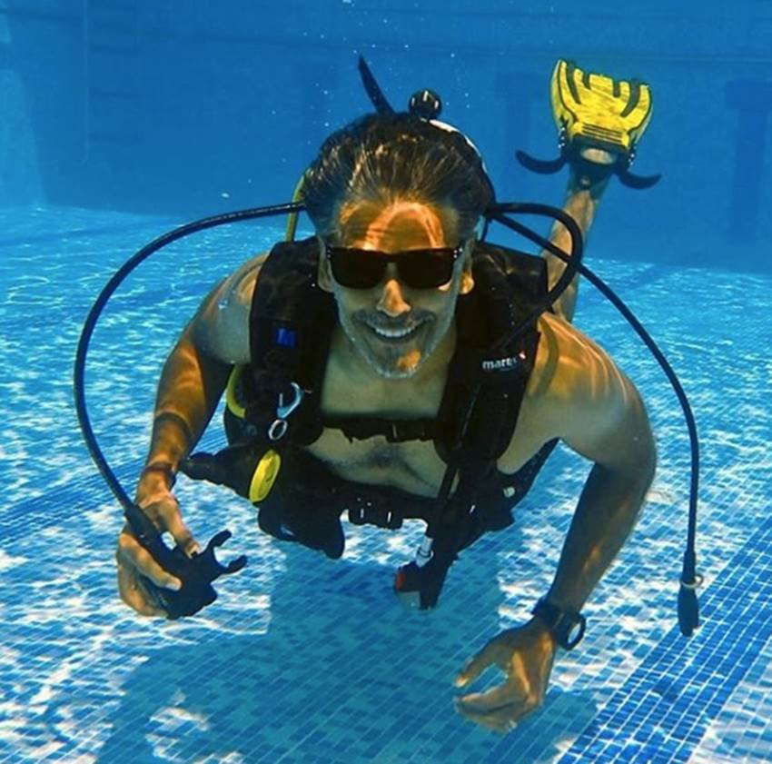 photos of Milind Usha Soman, Ankita Konwar in maldives, special moments of milind and ankita, ankita and milind soman in blue sea, seebeautiful pictures of milind soman and ankita, milind wife ankita konwar, entertainment news