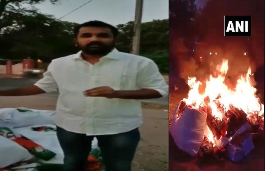 चुनाव सामग्री सहित पार्टी झंडे में लगी आग और नेता कृष्णक, फोटो सोर्स- ANI