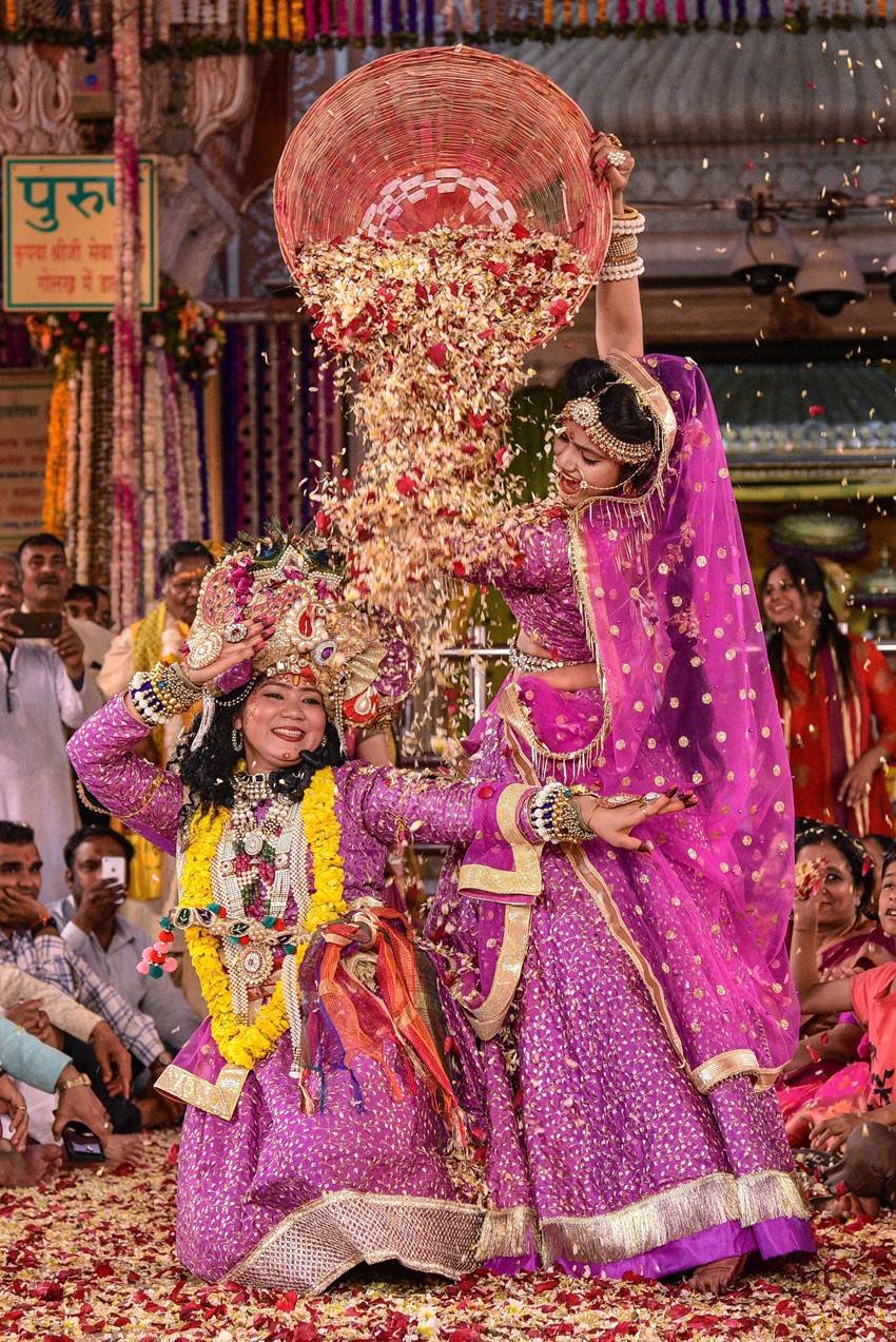 Traditional,Holi,lathmar holi,People celebrate,Mathura, holi, spring season, flowers, natural colours, artificial colours, holi festival, holi 2019,