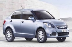 खतरे की घंटी? देश की सबसे बड़ी कार कंपनी मारुति सुजुकी इंडिया ने कम किया प्रोडक्शन