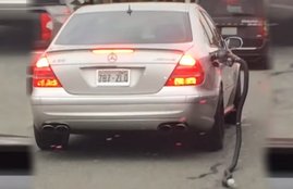 Mercedes-Benz E55 AMG, Fuel Pump Nozzle, Hose Stuck In The Car, fuel pump nozzle stuck in car, amazing car video, weird car videos, funny car video