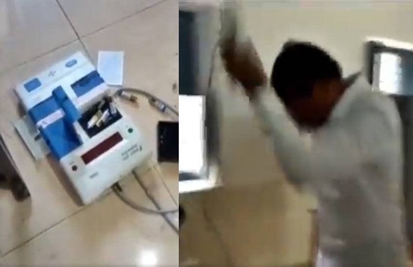 EVM तोड़ता जन सेना पार्टी प्रत्याशी मधुसूदन गुप्ता (वीडियो से कैप्चर स्नैपशॉट- ANI)