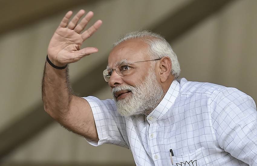 narendra modi, narendra modi rally, narendra modi photo, narendra modi smiling, narendra modi waving, narendra modi election rally, narendra modi kolkata rally, narendra modi brigade parade ground