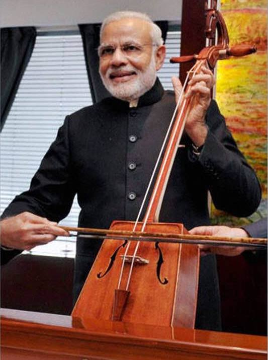 Meghalaya,Narendra Modi, Meghalaya visit,North Eastern Council meet, narendra modi, india, china, visit, prime minister, selfie, music, government, modi beat nagada, modi playing musical instruments