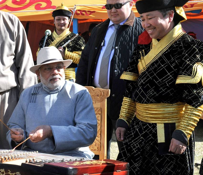 Meghalaya,Narendra Modi, Meghalaya visit,North Eastern Council meet, narendra modi, india, china, visit, prime minister, selfie, music, government, modi beat nagada, modi playing musical instruments