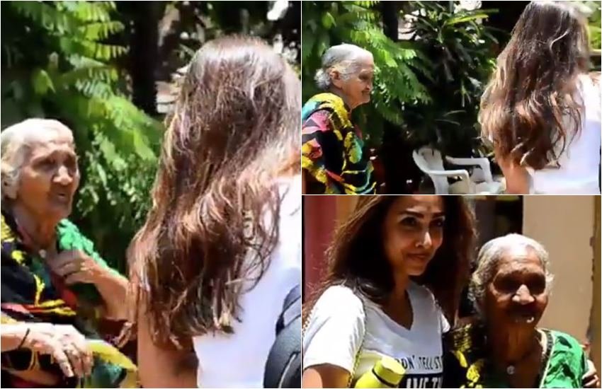 मलाइका अरोड़ा और दूसरी तरफ बूढ़ी महिला फैन