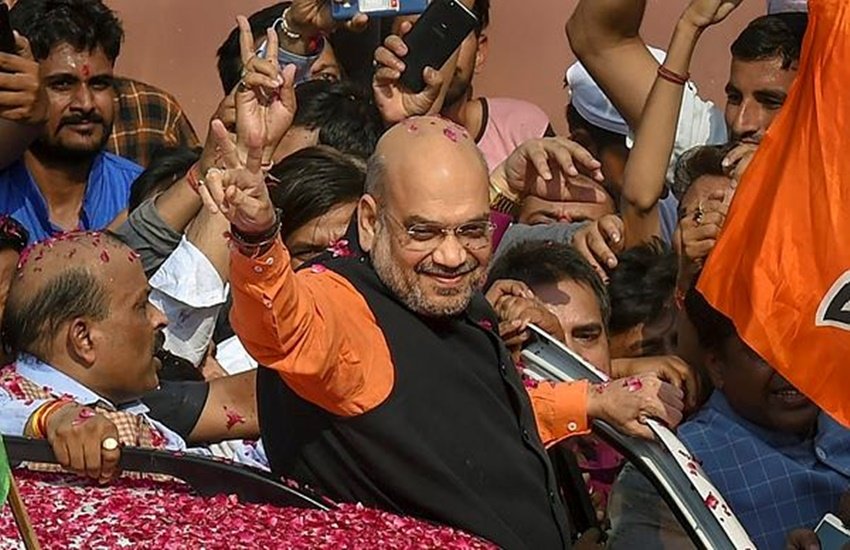 लोकसभा चुनाव में जीत के बाद दिल्ली के पार्टी मुख्यालय पहुंचे अमित शाह (फोटोः पीटीआई)