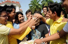 smearing cake on face