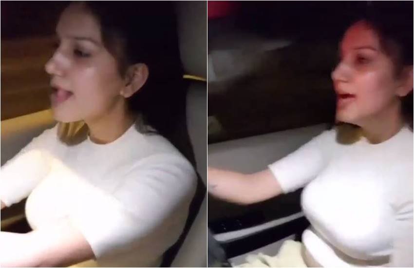 Sapna Chodhary stopped by Fans, Sapna Choudhary Get Trolled in A tIK tOK video, Desi Girl attempted Tik TOK While Driving Car, Sapna Choudhary driving car Without Tie Seat Belt, Sapna choudhary Driving Car, entertainment news, bollywood news, television news