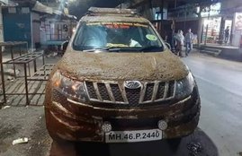 Mahindra XUV500 covered with cow dung, Dr Dr Navnath Dudhal, suv cover with cow dung, vehicle covered with cow dung,