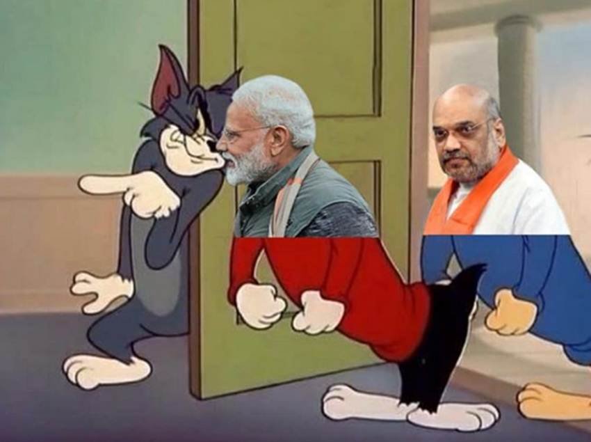 इस फोटो में बेहद लोकप्रिय कार्टून कैरेक्टर टॉम एंड जेरी की तस्वीरों पर पीएम मोदी और आमित शाह की फोटो लगा दी गई है।