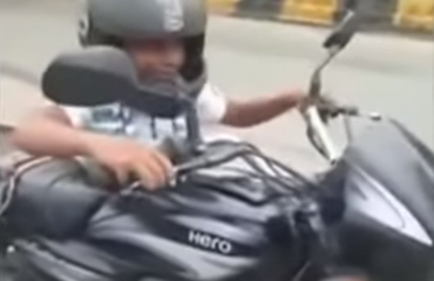 Motor Vehicle Act, 8 year old child driving bike, child driving bike in lucknow, lucknow viral video, child gets fine, traffic rule and fine