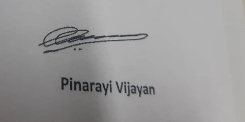 केरल के मुख्यमंत्री पिनरयी विजयन हस्ताक्षर में क्या लिखा है यह समझ पाना बड़ा कठिन है।
