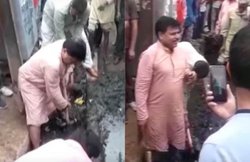 VIDEO: नरेंद्र मोदी के स्वच्छता अभियान में आगे आए कांग्रेसी मंत्री? चप्पल पहन उतरे नाली में, फावड़ा ले की सफाई