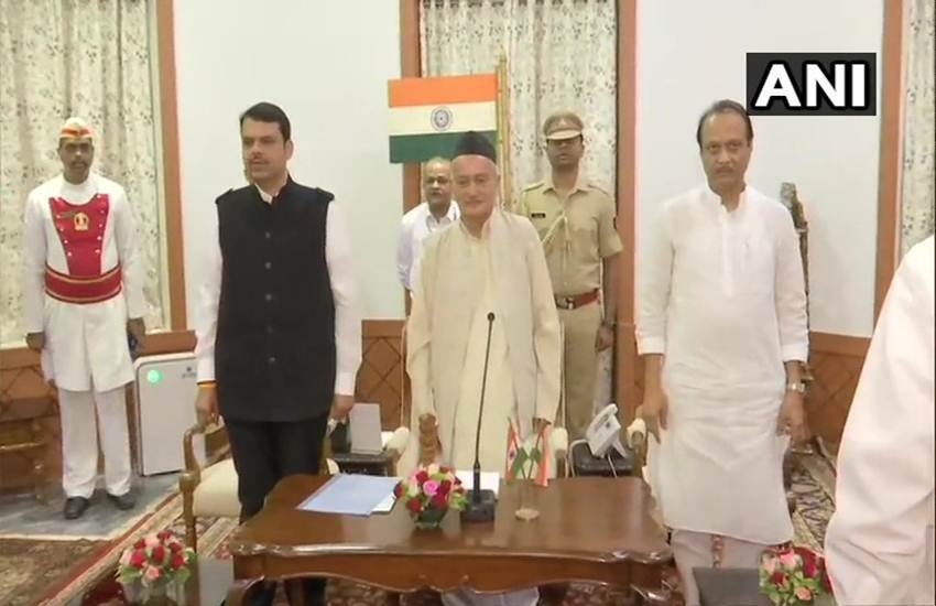 शनिवार को सुबह बीजेपी नेता देवेंद्र फडणवीस ने सीएम और एनसीपी नेता अजीत पवार ने डिप्टी सीएम के पद की शपथ ली। (फोटो क्रिडेट/ ANI Twitter Handle) 