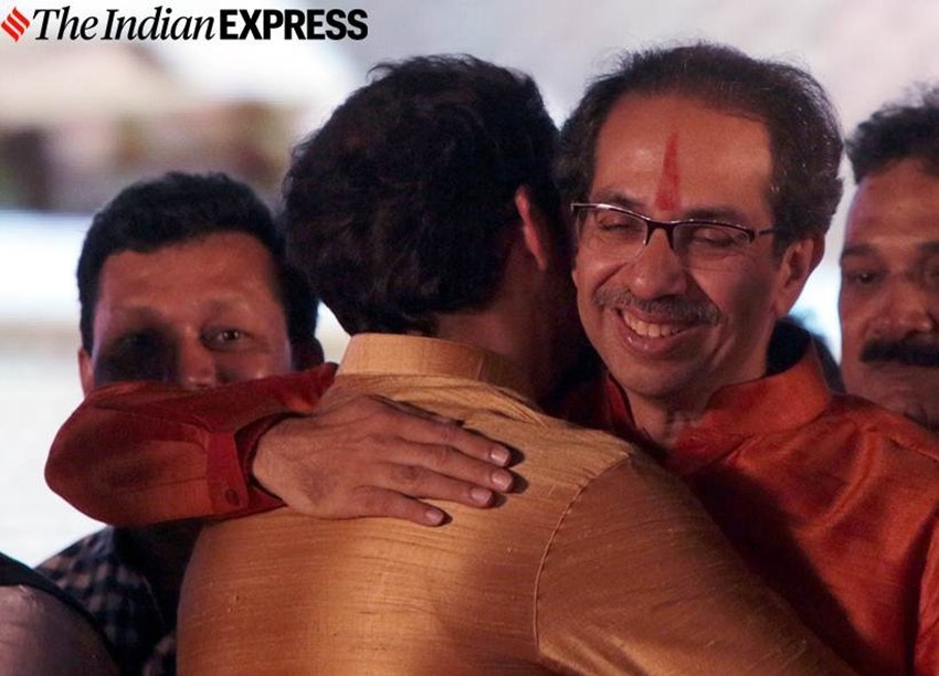 सीएम पद की शपथ लेने के बाद अपने बेटे आदित्य के गले मिलते हुए उद्धव ठकरे के चेहरे पर उनकी खुशी कुछ यूं झलक रही थी। (Express photo: Pradip Das)