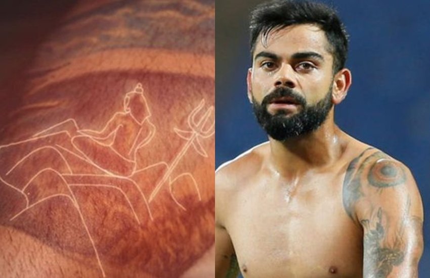 आज की तारीख में अगर कोई कहे कि विराट कोहली भी एक आम इंसान की तरह हैं तो ये सरासर गलत होगा। विराट कभी आम नहीं हो सकते। आज हर कोई विराट कोहली की तरह बनना चाहता है। क्रिकेट की दुनिया में कोहली का नाम जितना विराट हो चला है उस मुकाम को हासिल करना हर किसी के बस की बात नहीं। अपने खेल से लेकर लाइफस्टाइल तक में विराट अपने नाम की ही तरह विराट हैं। विराट कोहली ने अपने शरीर पर 9 टैटू बनवाए हैं। कुछ दिखते हैं तो कुछ कपड़ों से ढके रहते हैं। आइए डालते हैं नजर विराट कोहली के इन टैटूज पर और समझते हैं कि किस टैटू का क्या मतलब है।( सभी तस्वीरें 24 सितंबर 2018 को National Geographic पर प्रसारित मेगा आइकन एपिसोड ली गई हैं)