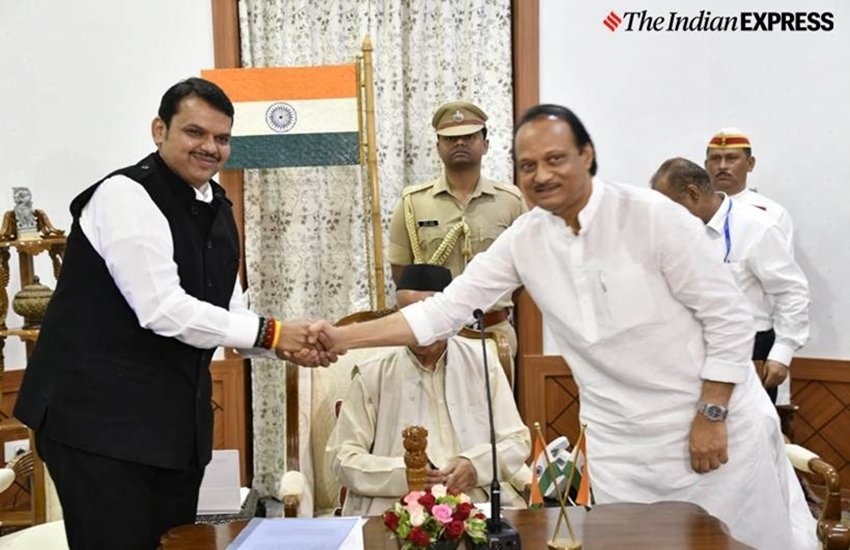 महाराष्ट्र में शनिवार सुबह बड़ा राजनीतिक उलटफेर देखने को मिला है। शनिवार सुबह बीजेपी ने एनसीपी के साथ मिलकर सरकार बना ली। राज्यपाल भगत सिंह कोश्यारी ने देवेंद्र फड़णवीस को सीएम पद की शपथ दिलाई। वहीं एनसीपी के अजित पवार ने डिप्टी सीएम पद की शपथ ली। शुक्रवार शाम तक मीडिया से लेकर सोशल मीडिया तक में इस तरह की चर्चा थी कि शिवसेना, कांग्रेस और एनसीपी मिलकर सरकार बना लेंगी। मीडिया में तो सूत्रों के हवाले से संभावित मंत्रियों तक के नाम भी दिखाए जाने लगे थे। हालांकि शनिवार सुबह सारी सूरत ही बदल गई। आइए डालते हैं महाराष्ट्र के राजनीति की उन तस्वीरों पर एक नजर जिसकी कल्पना शायद ही किसी ने की हो। (All Pics: Indian Express)