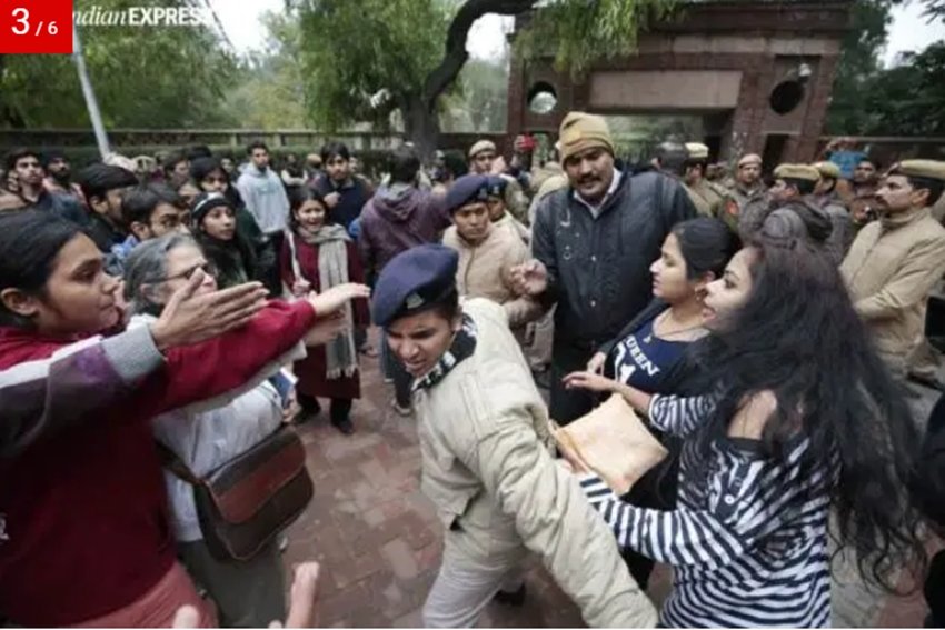 दिल्ली यूनिवर्सिटी में प्रदर्शन के दौरान AISA और ABVP के छात्र आपस में उलझ गए।(Express photo: Praveen Khanna)