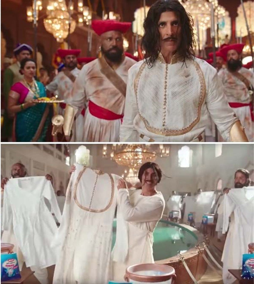 विज्ञापन में अक्षय को राजा की भूमिका में नाचते-नाचते बाल्टी में कपड़े धोते दिखाया गया है।