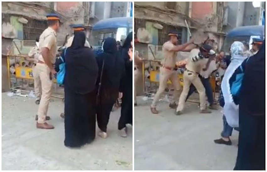 मुंबई पुलिस ने सीएए के खिलाफ धरने को कवर करने गए फोटोग्राफर की पिटाई कर दी। (Video grab/Twitter@mumbaipressclub)