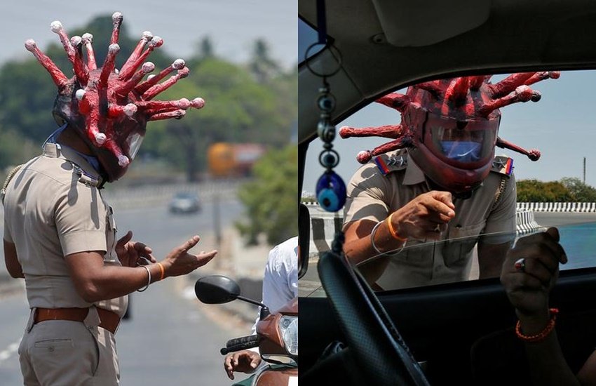 कोरोना वायरस (Coronavirus) के बढ़ते संक्रमण पर रोकथाम के लिए देशभर में लॉकडाउन (Lockdown) किया गया है। बावजूद इसके तमाम लोग ऐसे हैं जो घर से बाहर निकल रहे हैं। ऐसे लोगों को समझाने के लिए चेन्नई पुलिस खुद कोरोना अवतार में सड़क पर उतरी है। दरअसल लोगों को कोरोना वायरस के खतरे से जागरूक करने के लिए वायरस की शक्ल का हेलमेट पहन चेन्नई पुलिस को सड़क पर उतरना पड़ा है। (फोटो - रॉयटर्स)