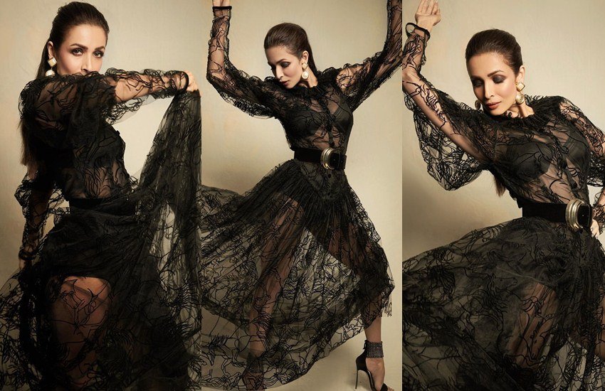 बॉलीवुड एक्ट्रेस मलाइका अरोड़ा (Malaika Arora) इन दिनों फिल्मों से दूर हैं। एक्टिंग से दूर होने के बावजूद भी वह अकसर लाइमलाइट में रहती हैं। कभी अपने रिलेशनशिप को लेकर वह सुर्खियों में रहती हैं तो कभी अपनी तस्वीरों को लेकर। हाल ही में मलाइका ने ब्लैक ट्रांसपैरेंट ड्रेस में एक फोटोशूट कराया जो वायरल हो रहा है। इन तस्वीरो पर लाखों लाइक्स और हजारों कमेंट्स आ चुके हैं।