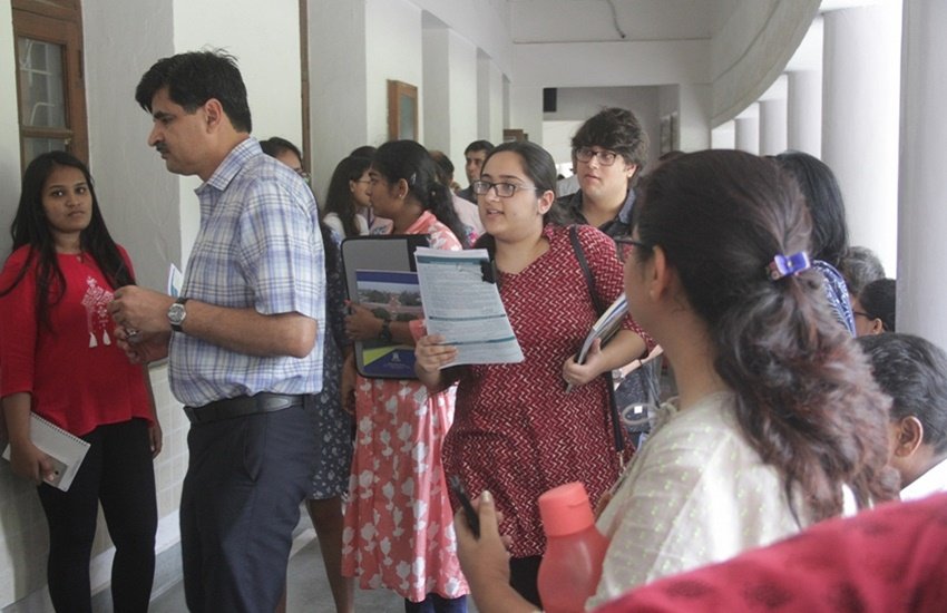 New Delhi: Aspirants queue up at Delhi University's Shri Ram College of Commerce for admissions after DU colleges released their first cut-off list for admissions to the universityâs undergraduate courses for the academic year, in New Delhi on June 28, 2019. (Photo: IANS)