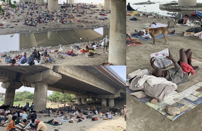 सोशल मीडिया में कुछ तस्वीरें वायरल हो रही हैं। इन तस्वीरों ने तमाम सरकारी दावों की पोल खोल कर रख दी है। तस्वीरें देश की राजधानी दिल्ली में यमुना नदी के पुल के नीचे की हैं। तस्वीरों में दिख रहा है कि सैकड़ों की संख्या में लोग पुल के नीचे रहने को मजबूर हैं। इनके पास ना तो छत है ना बिछौना और ना ही खाने को कुछ सामान। इस तरह की बातें सामने आईं कि इन लोगों को एक वक्त का खाना भी बमुश्किल मुहैया हो पा रहा था।
