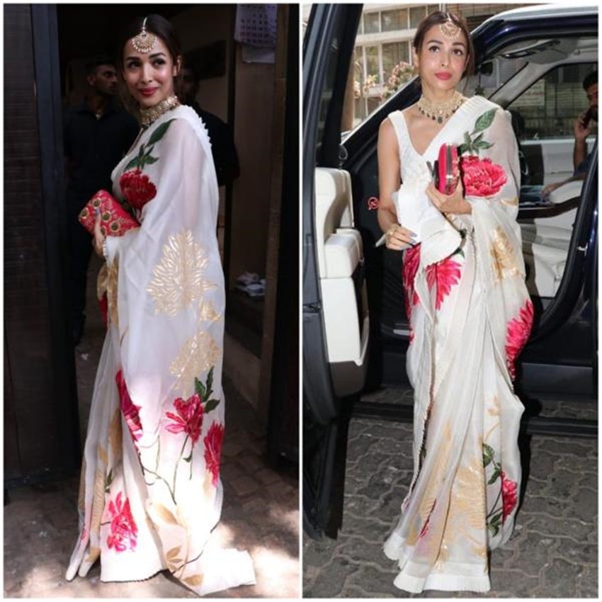 इस खूबसूरत साड़ी में मलाइका बेहद सुंदर लग रही थीं, लेकिन बावजूद इसके उन्हें ट्रोलिंग का शिकार होना पड़ा।