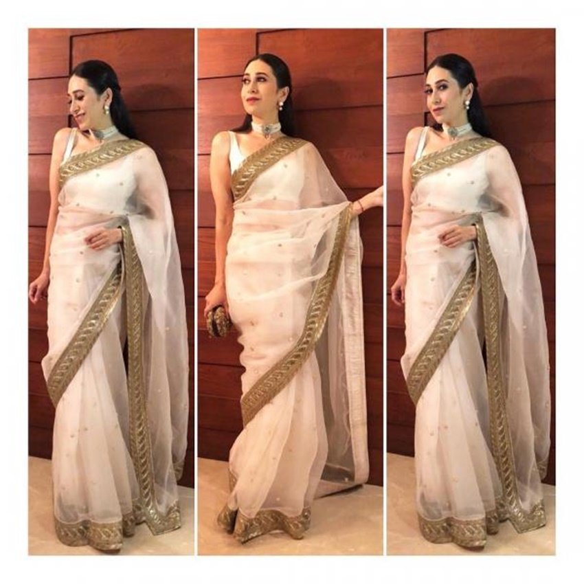करिश्मा कपूर सब्यसाची की इस डिजाइनर साड़ी में किसी परी सरीखी लग रही हैं।