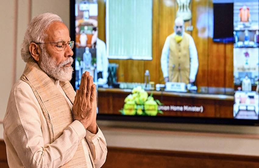 अंतरराष्ट्रीय योग दिवस बिना जन समूहों के डिजिटल मीडिया माध्यमों के जरिए ही मनाया जा रहा है। (PIB/PTI Photo)