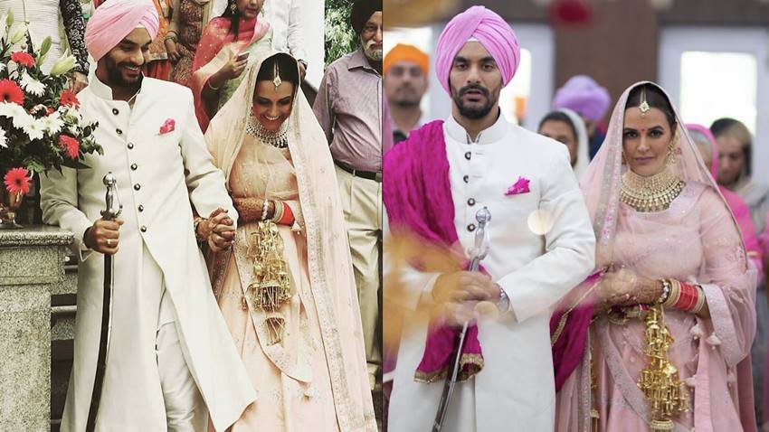 Neha Dhupia - इन्होंने शादी में कुंदन मोती चोकर सेट के साथ ब्लश पिंक रंग का लहंगा पहना था। लोग इनकी गहनों और लहंगे की तारीफ़ तो कर ही रहे थे, लेकिन उनके उंगलियों में बेदी परिवार की खानदानी अंगूठी की सबसे ज़्यादा बातें हुई थी।
