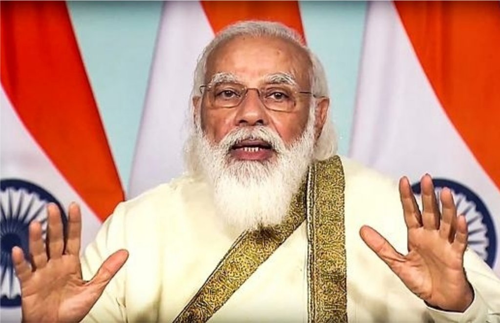 एएमयू के शताब्दी समारोह में संबोधित करते हुए प्रधानमन्त्री मोदी
(फोटो क्रेडिट - PTI)
