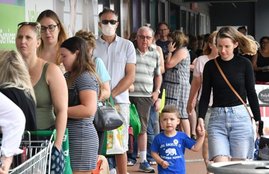People line up grocery store impending lockdown Brisbane